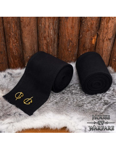 Winingas medievali in cotone nero, con fibule in ottone