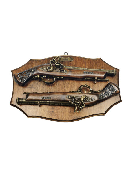 panoplia di legno con pistole