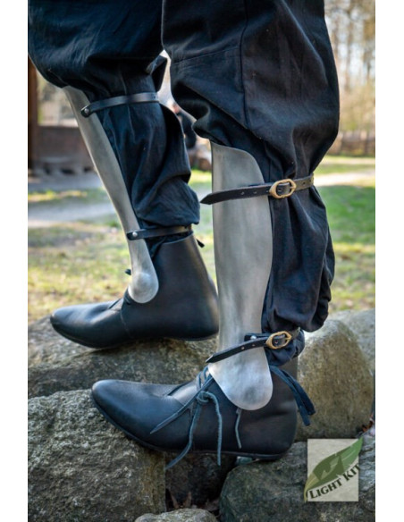 Schinieri da mercenario in acciaio...