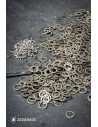 Anelli di maglia piatta con rivetti in acciaio oliato (9 mm.)