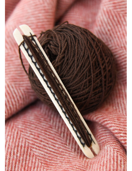 Navetta in osso con motivo intrecciato